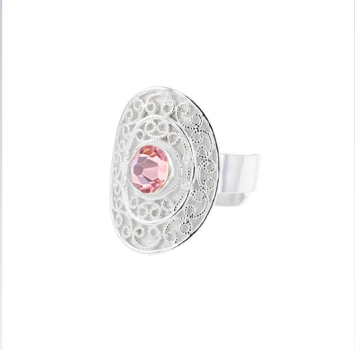 Ring med lyserosa krystall