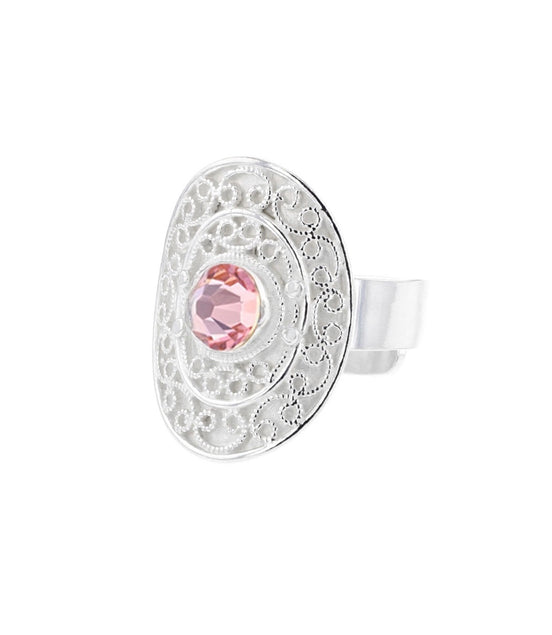 Ring med lyserosa krystall