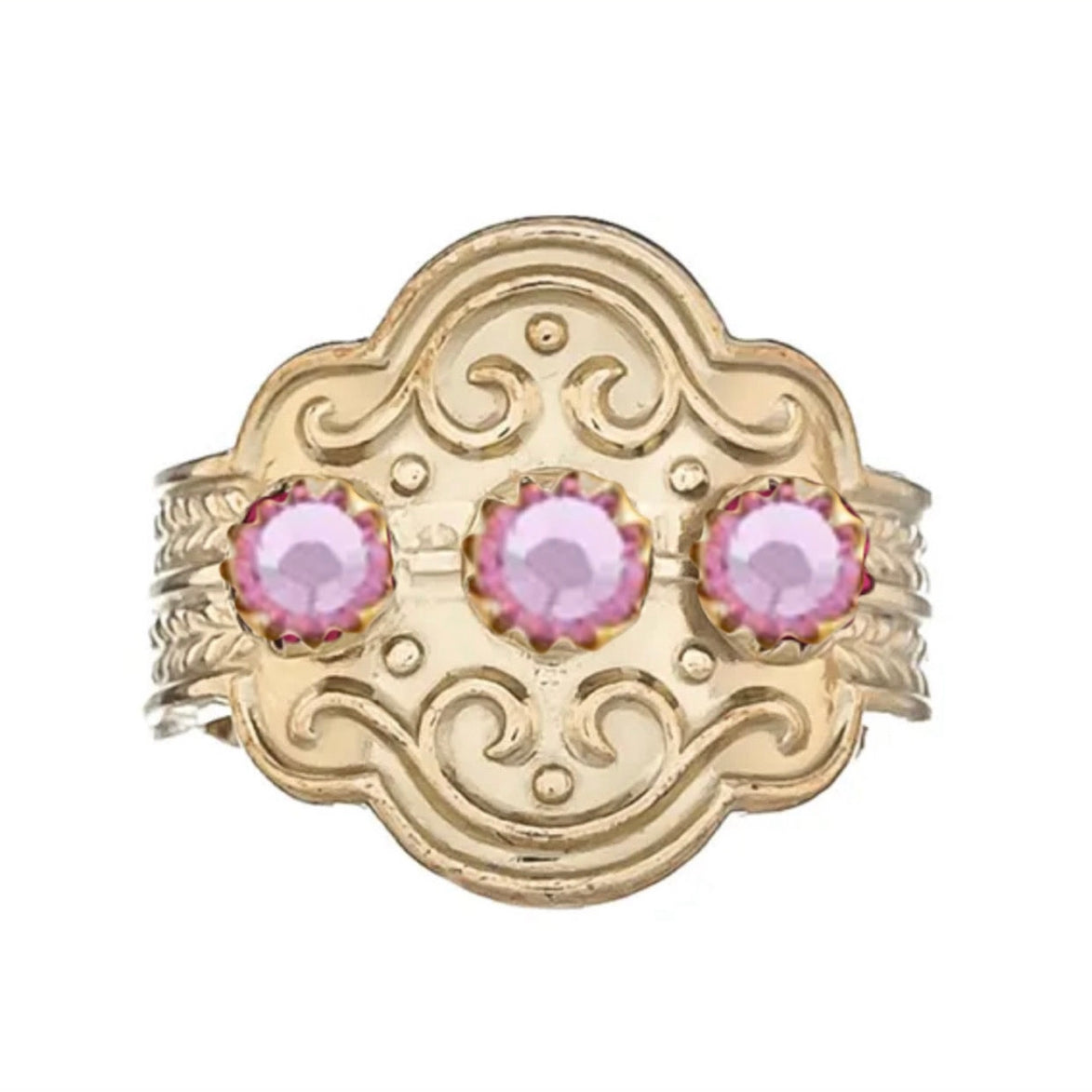 Ring med lyserosa krystall