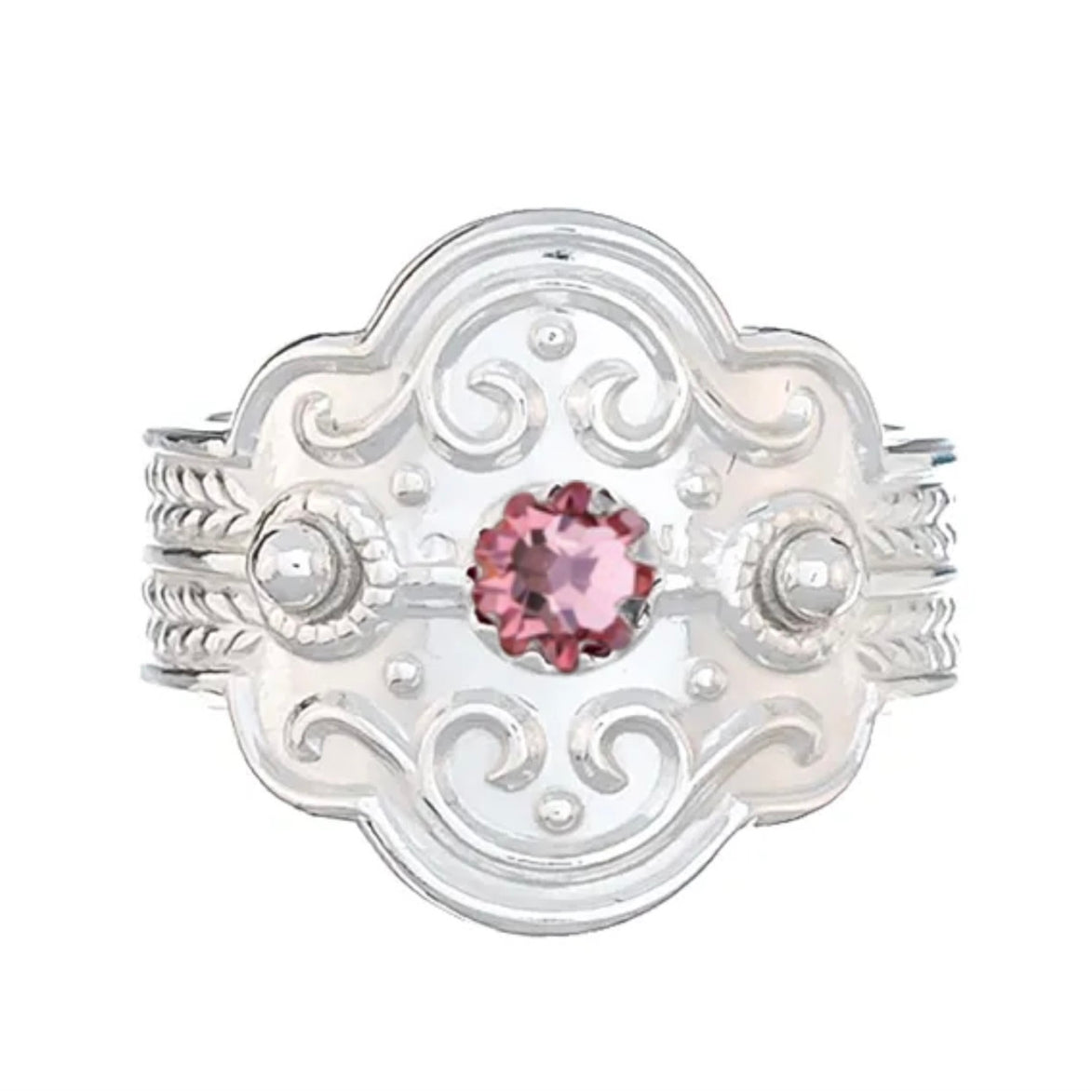 Ring med lyserosa krystall