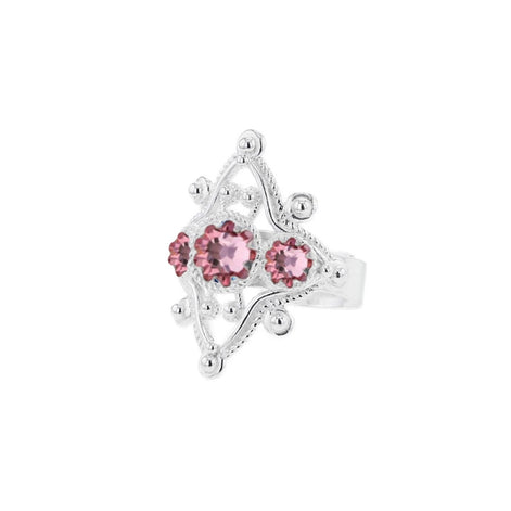 Ring med lyserosa krystaller