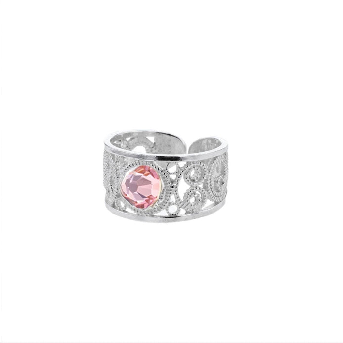 Ring lyserosa krystall