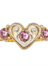 Ring med lyserosa krystall