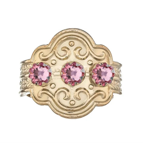 Ring med lyserosa krystall
