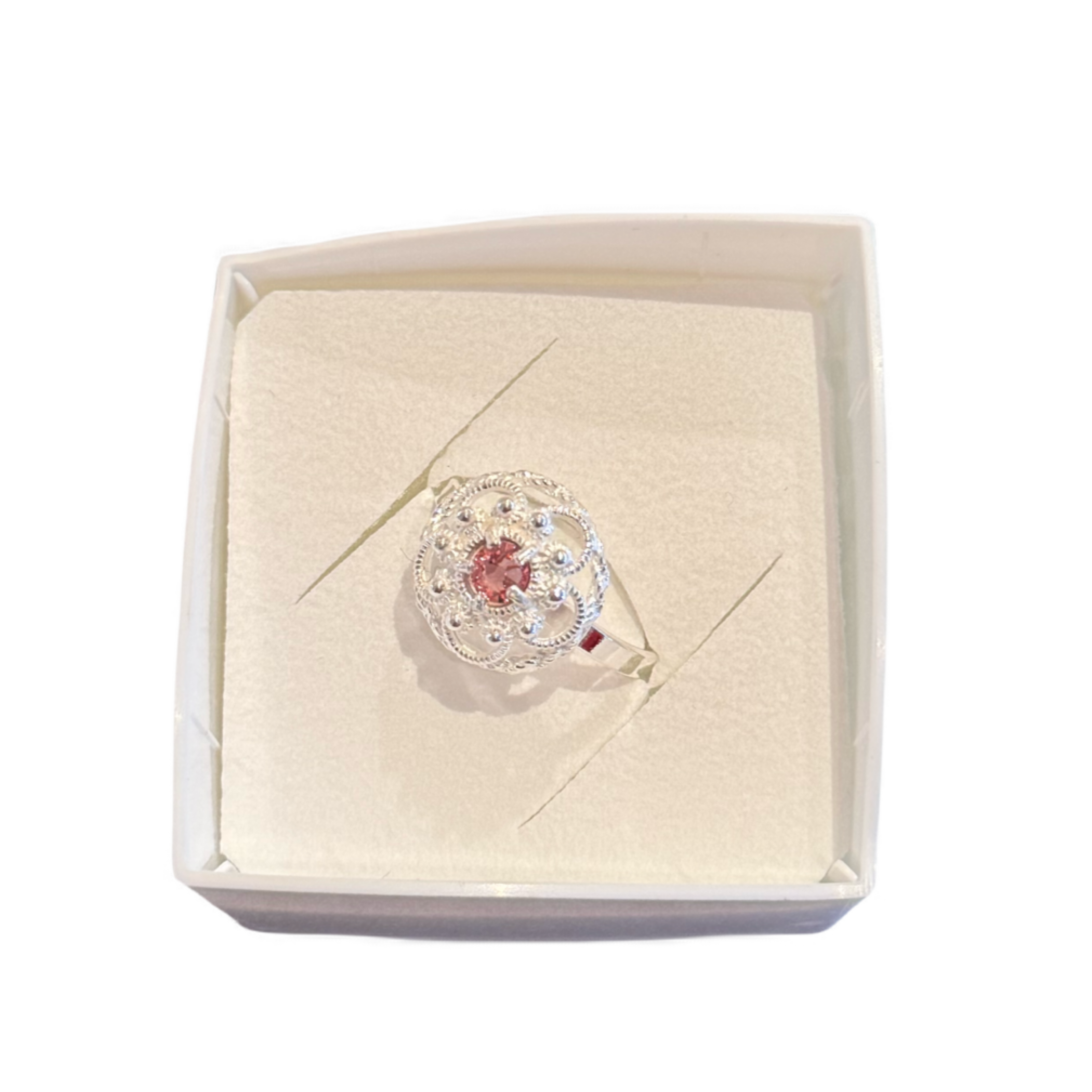 Ring med lyserosa krystall