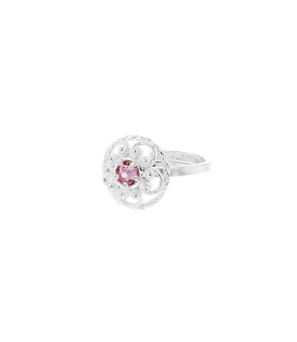 Ring med lyserosa krystall
