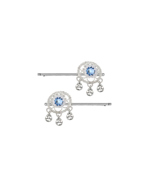 Ørepynt med lyseblå krystall